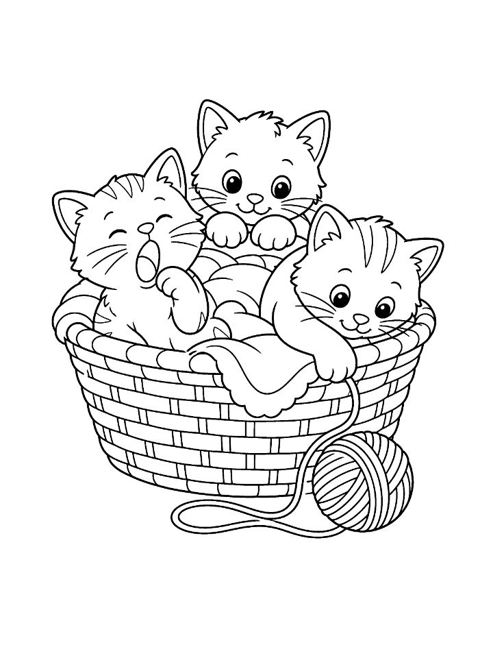 Coloriage de trois chatons dans un panier en osier, l'un qui regarde, l'un qui bâille et l'un qui joue avec une pelote